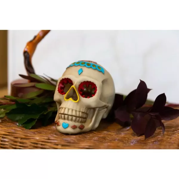 Flora Bunda 7 in. x 5 in. Polyresin Halloween Lighted Day of The Dead Skull with Color Changing LED Lights