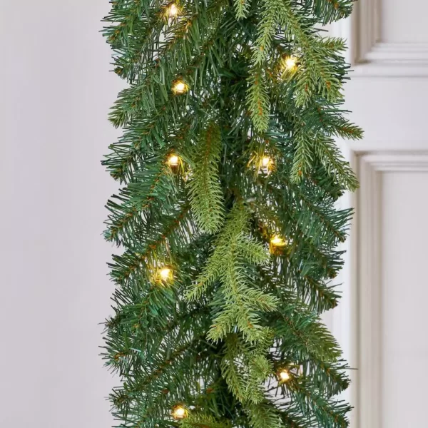 Home Accents Holiday 12 ft. Elegant Battery Operated Noble Fir LED Pre-Lit Christmas Garland with Timer and 70-Micro Dot Light