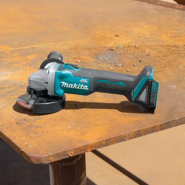 Makita 18V LXT Brushless 4-1/2 in./5 in. Angle Grinder, 1/2 in. Impact Wrench and 2 Gal. Vacuum with bonus 18V LXT Starter Pack